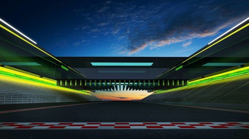 View of the infinity empty asphalt international race track with start and finish line, evening