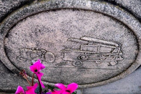 Funerary emblem of a tractor and combine, Ses Salines Cemetery, Majorca, Balearic Islands, Spain,