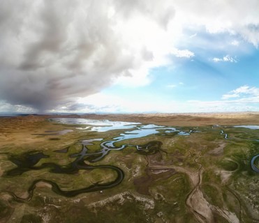 Aerial panorama sand desert Mongol Els and Zavkhan river