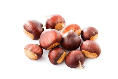 Chestnuts heap isolated on white background