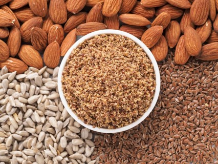 Homemade LSA mix in plate - Linseed or flax seeds, Sunflower seeds and Almonds. Traditional