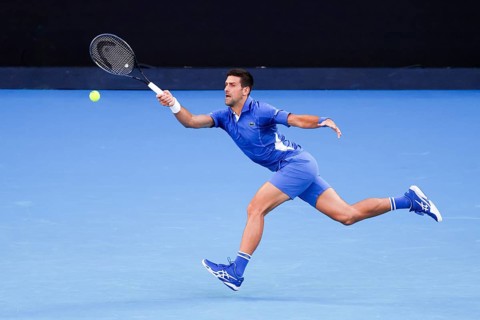 MELBOURNE, AUSTRALIA, JANUARY 11: Novak Djokovic of Serbia plays Stefanos Tsitsipas of Greece