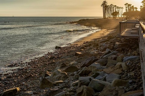 Beautiful sunset over the rocky coastline at Ventura Beach
