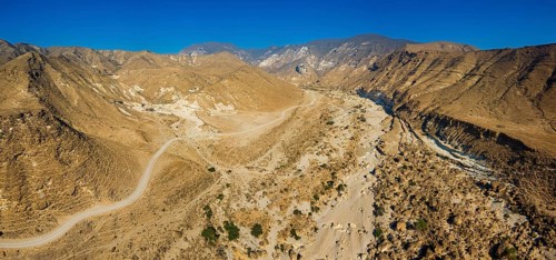 Landscape in Oman, mountains, Wadi Ashawq, road, dry riverbed Salalah, Al Mughsyal / Wadi Ashawq,