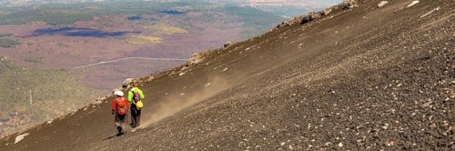 Mount Etna in Italy, Sicily. Climb Etna volcano to the top. Europe. Banner web with copy space
