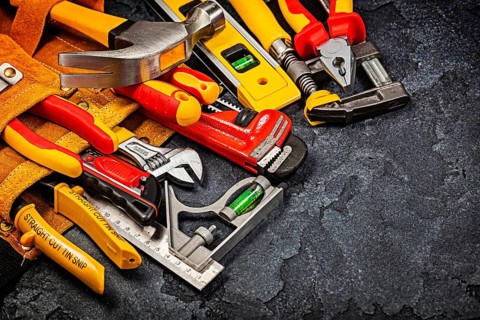 Construction Tools On Black Background
