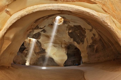Famous Belfry Beit Guvrin caves in Israel. Giant halls regular shape with a hole in the roof.