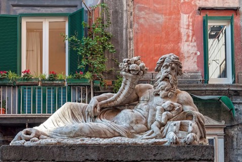 The marble statue of the Nile God in front of the church of Santa Maria Assunta dei Pignatelli,