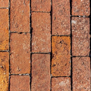 Detailed ancient red brick wall background photo texture
