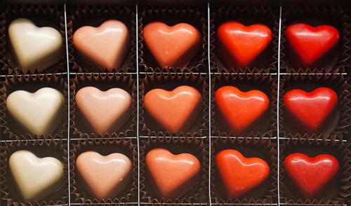 Heart shape chocolate pralines in the box