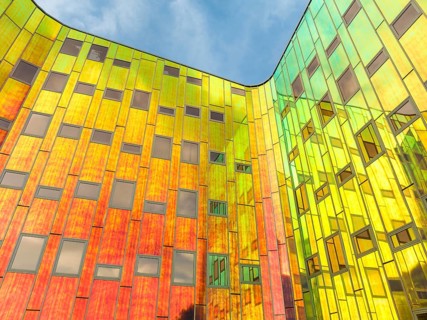 DEVENTER, NETHERLANDS, AUGUST 18, 2023: Colorful facade of a modern office building. The building