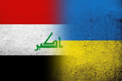 The Republic of Iraq National flag with National flag of Ukraine. Grunge background