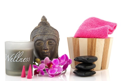 Stilllife with wellness objects as buddha towels and orchid flowers