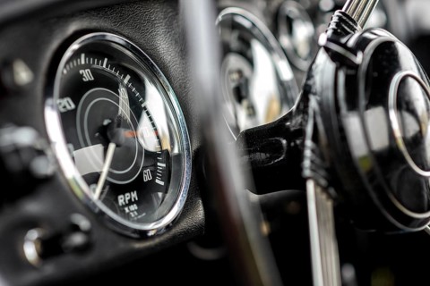 Details of a classic car in a museum