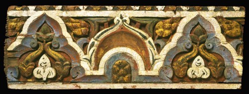 The panel's pattern achieves a fine balance between serving as a geometric border and comprising a