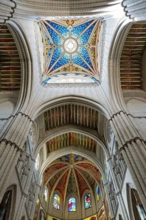 Almudena Cathedral: Iconic seat of Madrid's Archdiocese, built over a century, consecrated in 1993,