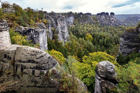Romantic trip to Saxon Switzerland. The picturesque sandy cliffs of Bastei, 200 meters high above