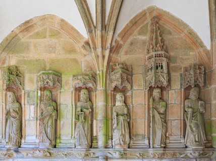 Statues of the apostles in the covered side entrance, enclosed parish Enclos paroissial, Eglise