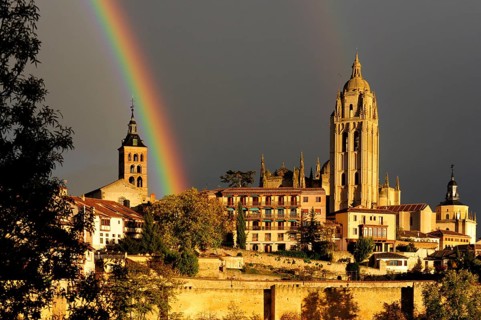 Rainbow between the church Iglesia de San Andres and the cathedral, historic city centre, UNESCO