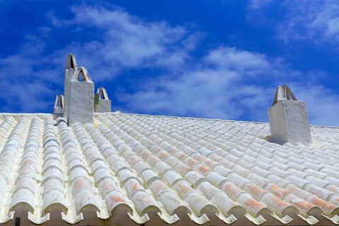 Binibequer Vell in Menorca White roof chimney Sant Lluis at Balearic Islands