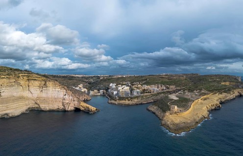 Drone view of Xlendi village and bay on Gozo Island in Malta
