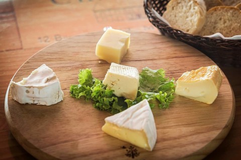 Mixed traditional french cheese platter with bread