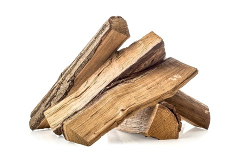 Stacked pine firewoods isolated on a white background