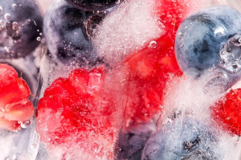 Raspberry and blackberry frozen in ice sticks, POLAND