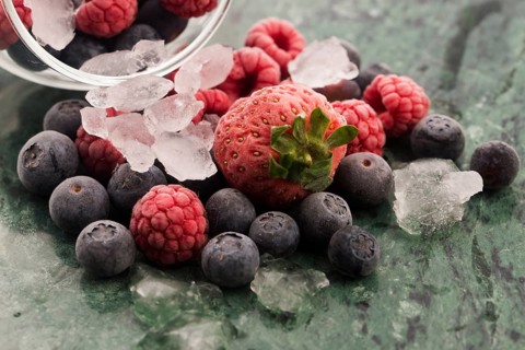 Closeup shot of frozen raspberries, blackberries and strawberries