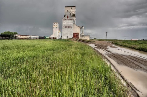 Prairie Grain Elevator in Saskatchewan Canada with storm clouds