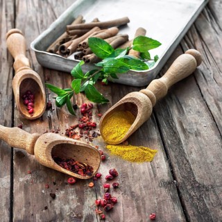 Set of different spices on the old wooden table.Photo rustic