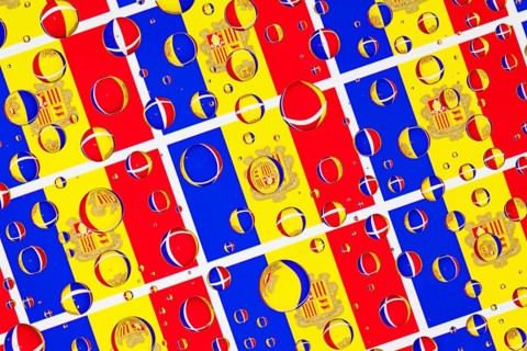Flags of Andorra, behind a glass covered with rain drops.Pattern from Andorra flags. 3D