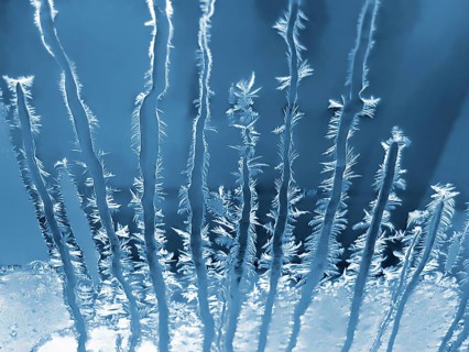 Frosty natural pattern on winter window