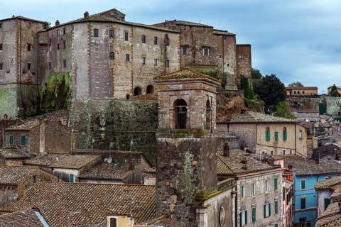 Italy, southern Tuscany. The tufa city of Sorano is a enchanted city from a fairy tale. Tiled roofs