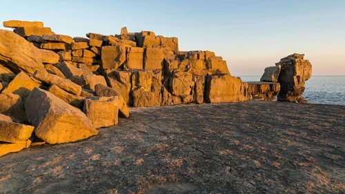 Evening light at Pulpit Rock, near Portland Bill lighthouse, Isle of Portland, Jurassic Coast,