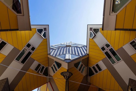 Rotterdam, Netherlands, May 8, 2022: Yellow cubic houses in Rotterdam. The Cubic Houses were