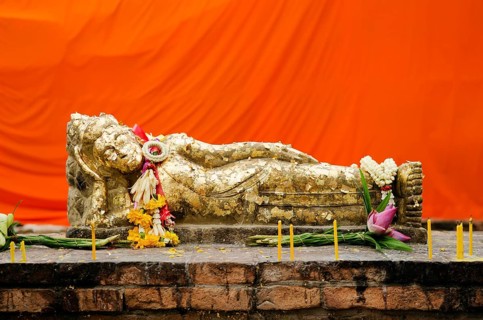 Reclining buddha statue with gold leaf in thailand