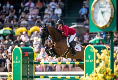 Tiffany Foster of Canada and riding Figor compete in the first round of the 1.60m CPKC