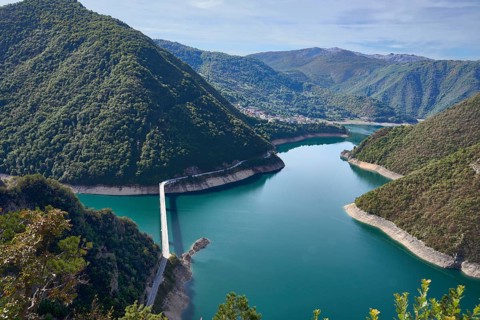 Pivsko jezero, Piva reservoir, behind the village of Plužine, bridge over the reservoir,