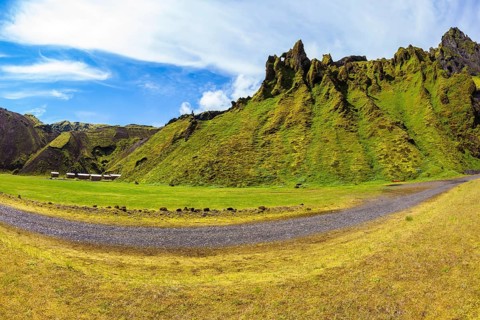 The photo was taken Fisheye lens. Camping in the canyon Pakgil, Iceland. The canyon - green grass