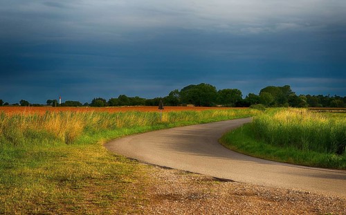 A road through the landscape of Schleswig Holstein, Germany, Europe