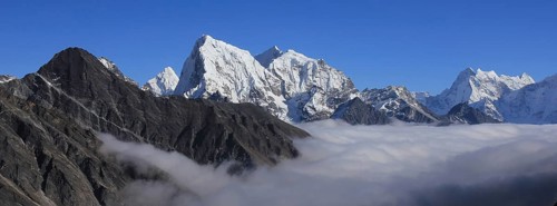 Sea of fog and peaks of Ama Dablam, Cholatse and Tobuche