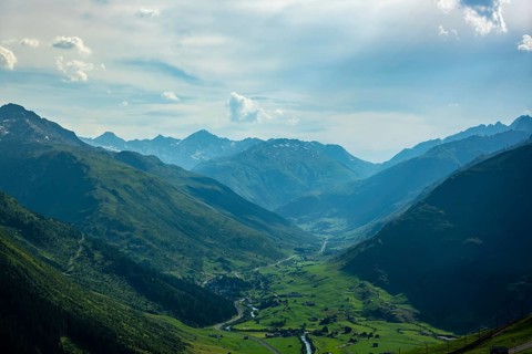 Beautiful Panoramic View over the Golf Course with Mountainscape and in a Mountain Valley in a