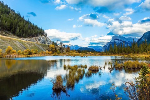 Group of lakes in the Canadian Rockies. Autumn day on the lake Vermilion. The concept of