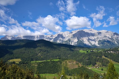 Panoramic view of the mountains with the Dachstein massif in green Styria - Austria