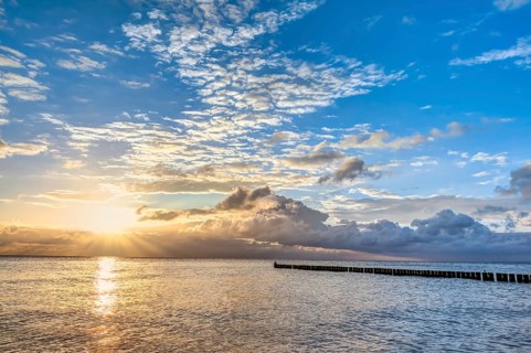 Wonderful sunrise at the beach in summer