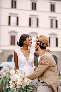Multiracial wedding couple. Wedding in Florence, Italy. African-American bride in a white dress