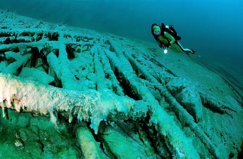 Diver in a mountain lake, Austria, Tyrol, Europe
