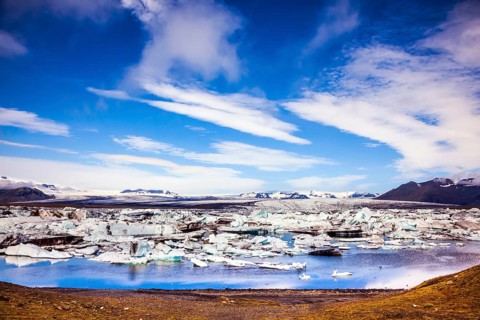 Sunrise in the Ice Lagoon. Drift ice Ice Lagoon - Jokulsarlon. Ice floes are reflected in the