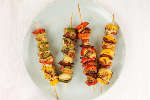 Kebab from meat and vegetable on plate, top view . BBQ food concept